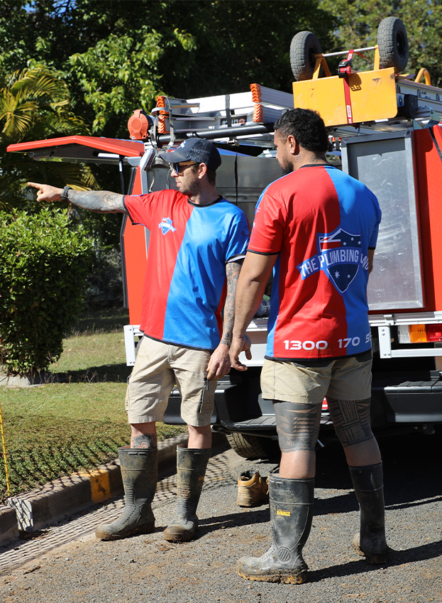 Plumbing Gang plumbers with their work ute