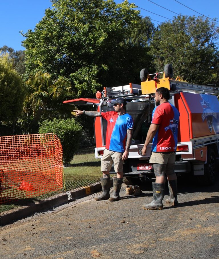 Plumbing Gang crew on site with safety fencing