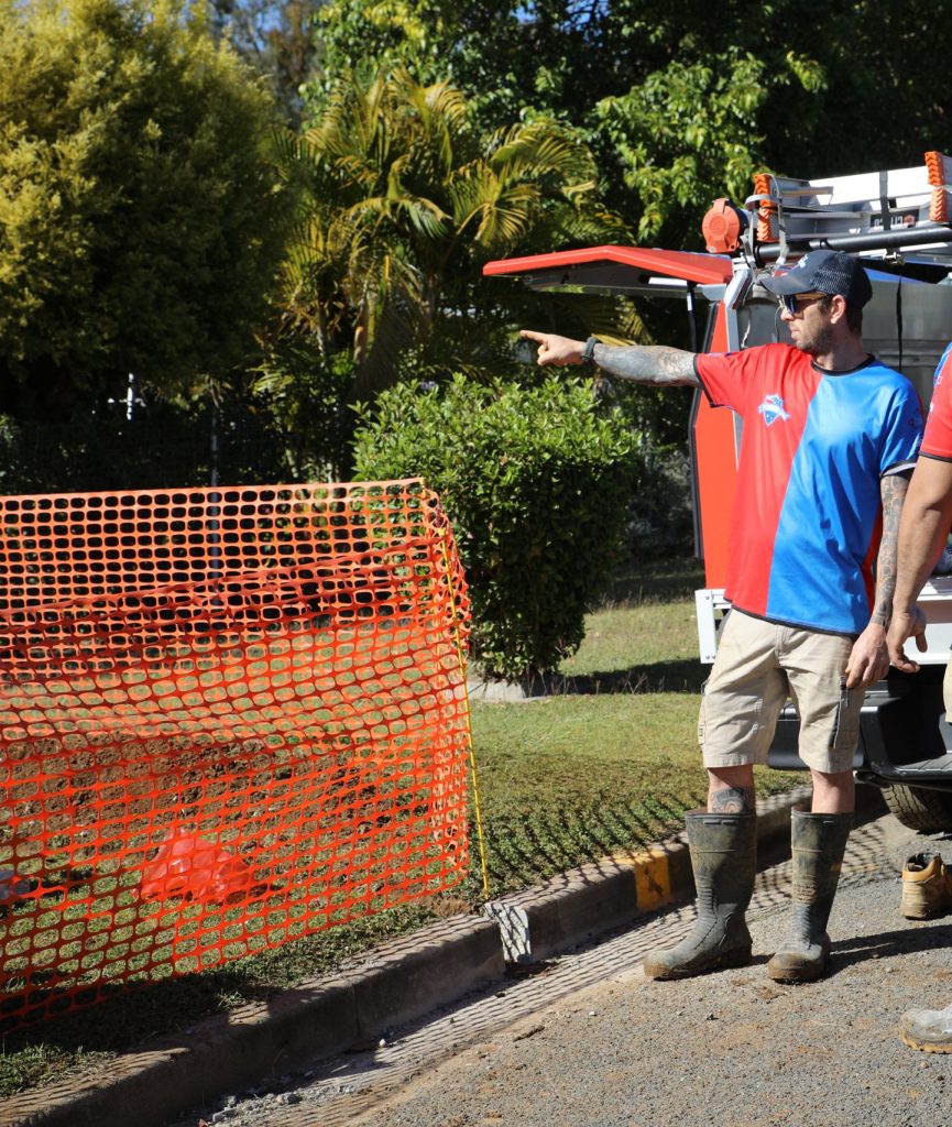 Plumber at a drain repair site