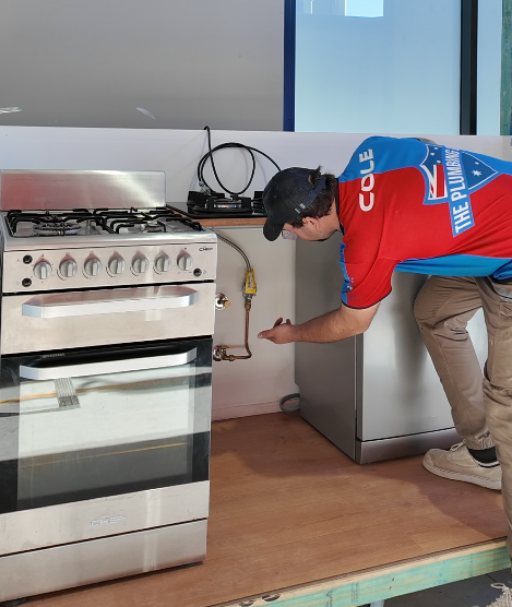 Gas oven being connected by a licensed gasfitter
