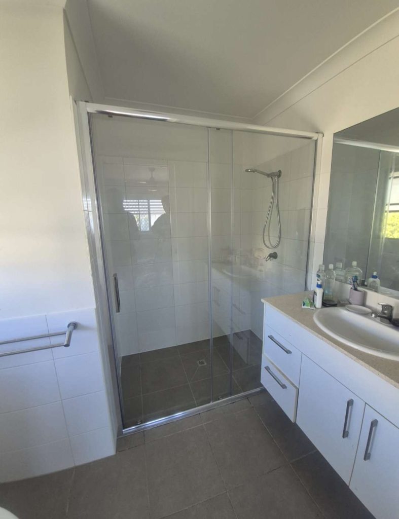 Glass shower screen installed in a bathroom