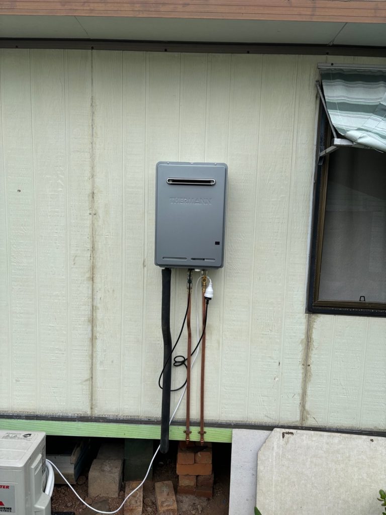 Gas hot water unit fitted to a caravan