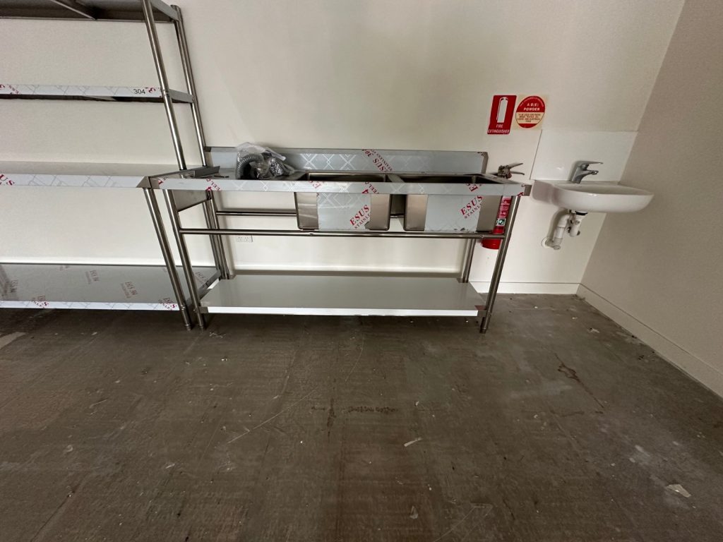 Commercial kitchen stainless sinks fitted by The Plumbing Gang