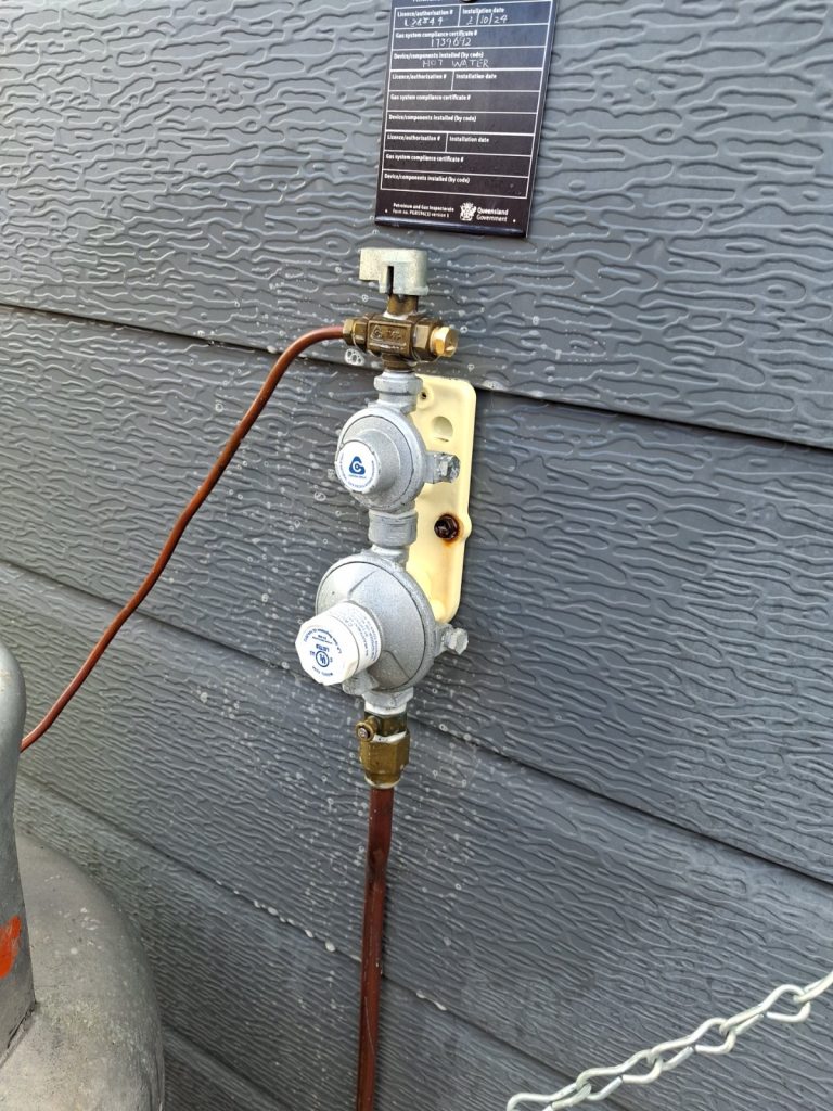 LPG two-stage gas regulator installed on an external wall