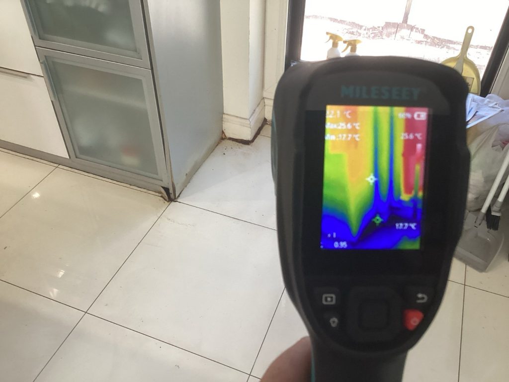 Thermal imaging camera used to detect a hidden water leak