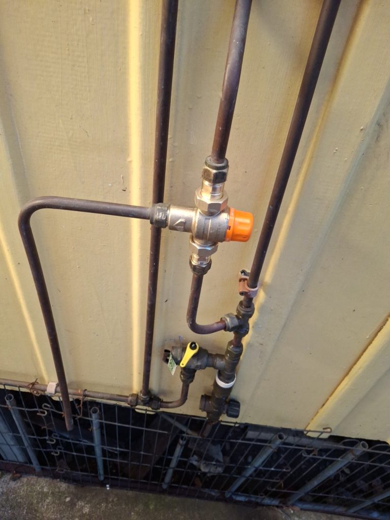 Copper pipework with a new pressure valve fitted